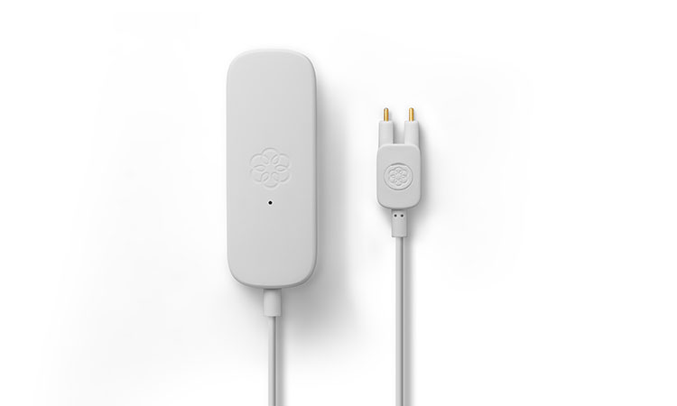 Ooma water sensor with metal tongs.