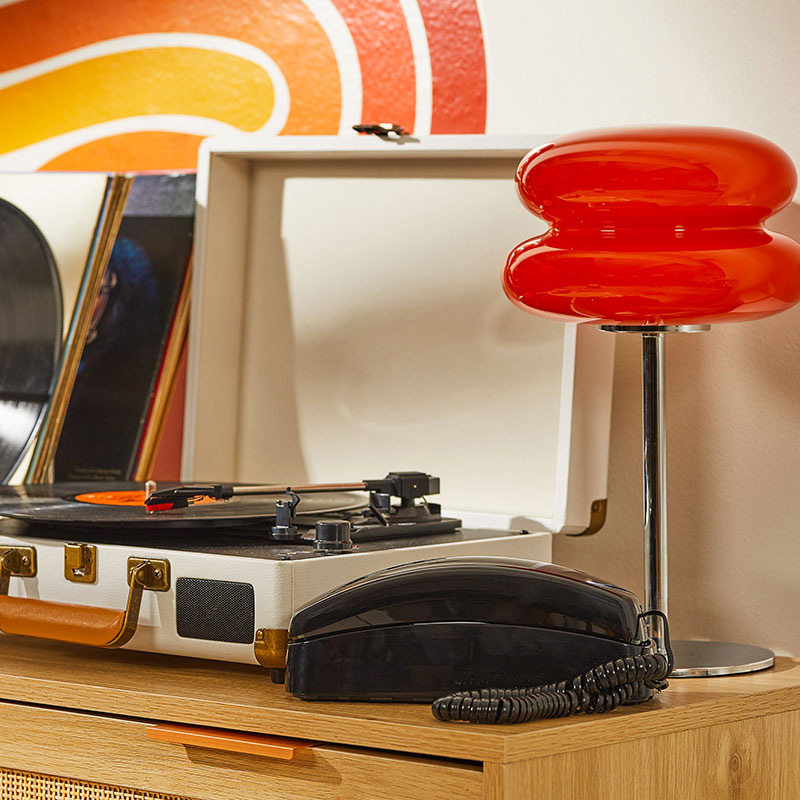 An image of Ooma Telo with Retro Black Phone on a table.