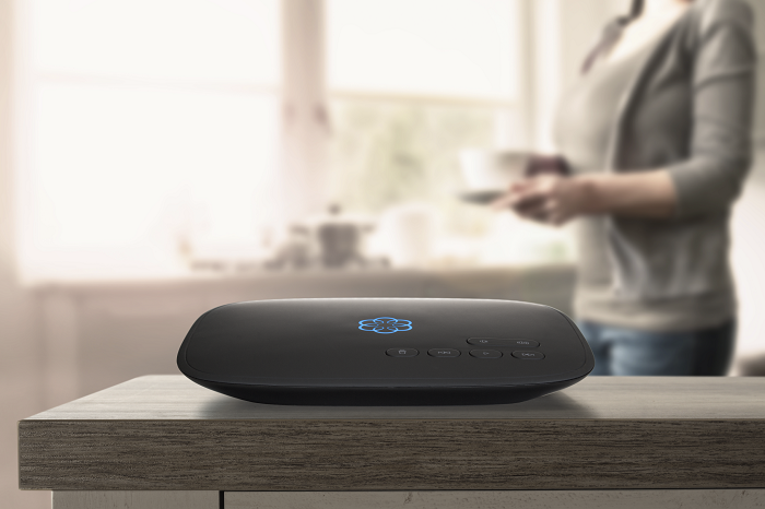 Ooma Telo base station sitting on a kitchen counter